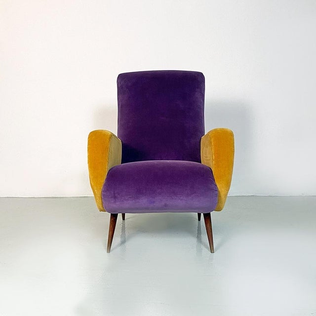 Italian mid century modern purple and yellow armchair with wood conical legs, 1960s Funny but elegant armchair with beech...