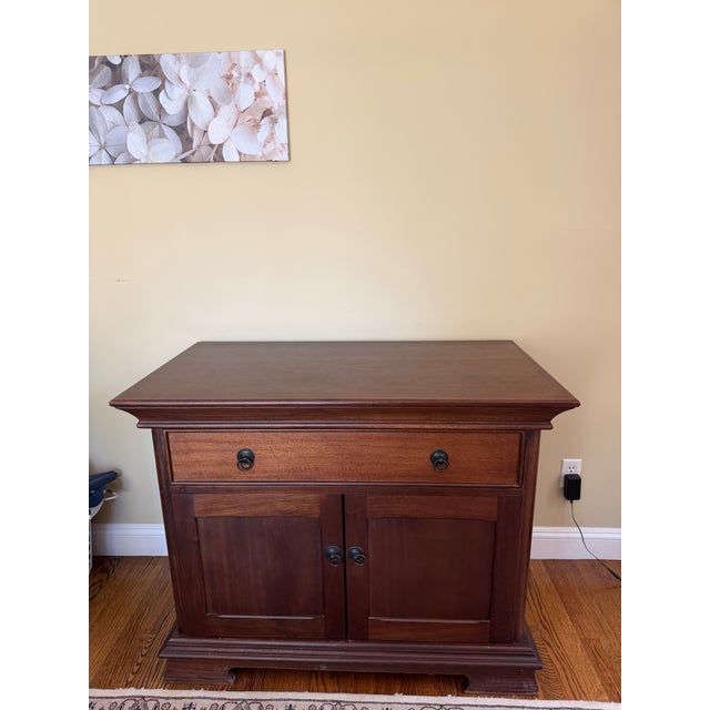 Beautiful vintage Medallion style server/commode cabinet in a rich warm cherry finish. Produced in the late 20th century,...