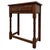 A charming and well-crafted 20th-century small side table, beautifully constructed in oak and distinguished by its compact...