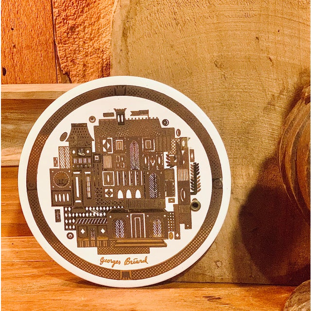 This mid-century modern porcelain trivet epitomizes Georges Briard’s sophisticated yet whimsical abstractions. A group of...