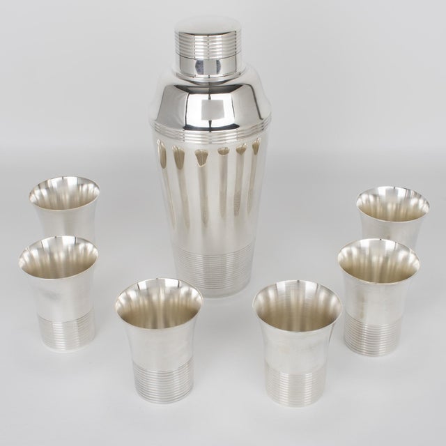 Silversmith Maison Gaston Dufour, Paris, designed this elegant French Art Deco silver plate barware serving set. The...