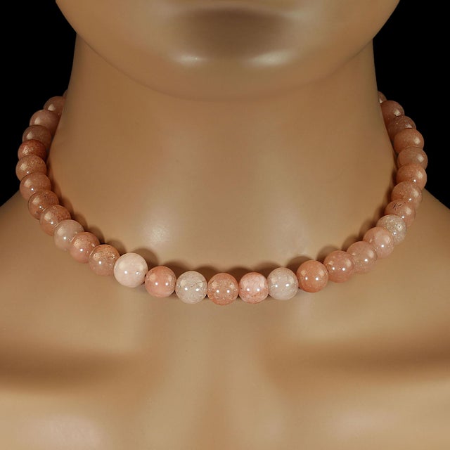 This beautiful 16‑inch peach and orange agate necklace brings a warm, sun‑kissed glow to any outfit, making it an ideal...