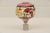 Lamp finial crafted from an ornately decorated Turkish ceramic ball or bead. This piece has a metal trimmed hole at its...