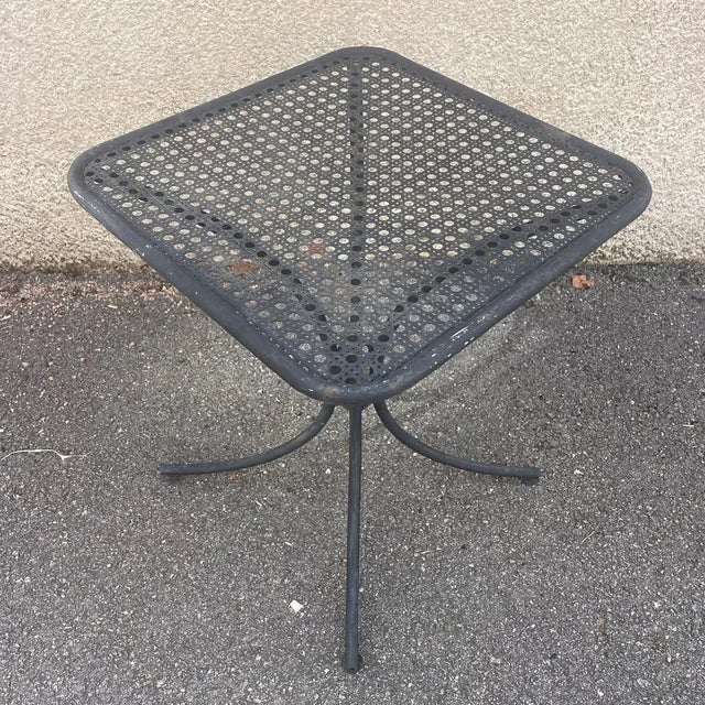Small wrought iron table from the 60s.