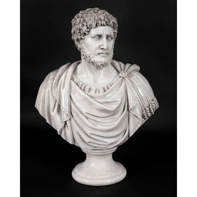 A beautifully sculpted pair of Italian marble busts of the famous Roman Emperors Lucius Verus and Antoninus Pius, mounted...