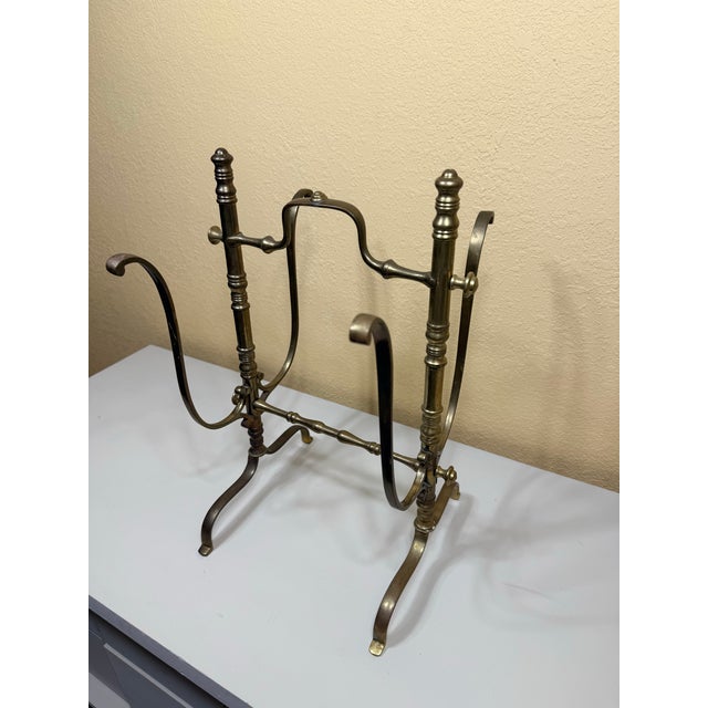 Antique brass log holder from the early 20th century. Space for holding actual logs in about 3.5in.