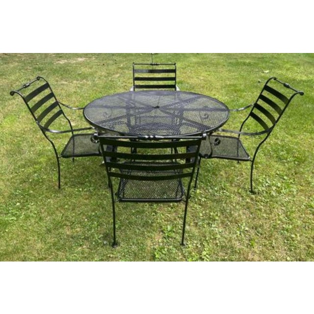 Perfect for your outdoor space! The metal table measures 48x28 and the wrought iron chairs measure 18.5x23x36 Very durable!