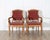 This elegant pair of Louis Philippe armchairs embodies the refined simplicity and balanced proportions of mid-19th century...