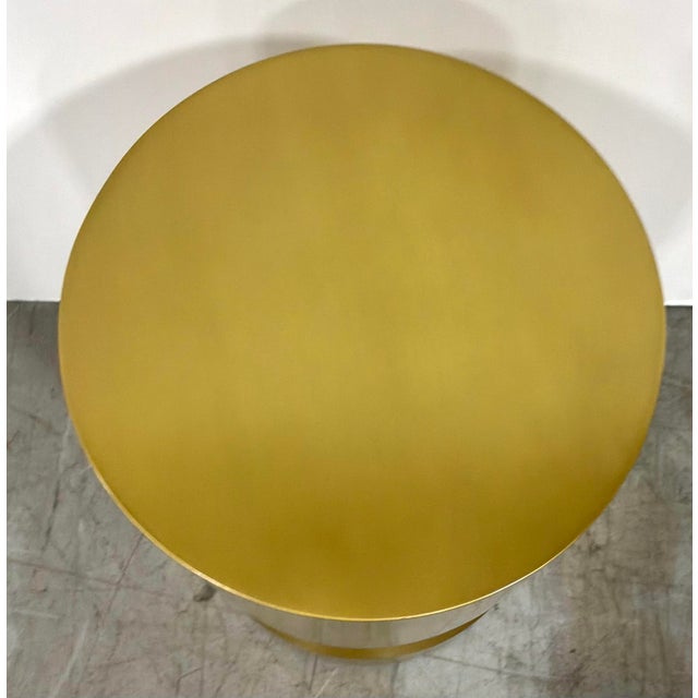 Original retail $3891. Stylish Baker Modern Satin Brass Mae Spot Table, showroom floor sample