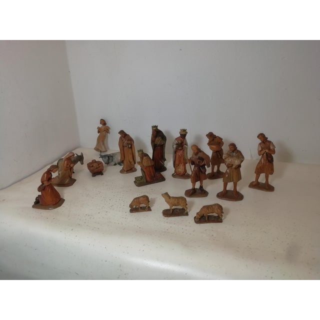Val Gardena nativity scene made of Swiss pine or Swiss pine wood. Carved, crafted, and colored entirely by hand. Composed...