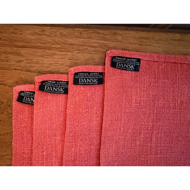Set of four mid-century Dansk Designs heavy woven linen placemats in rare coral/apricot color. Designed by Ritva Puotila...
