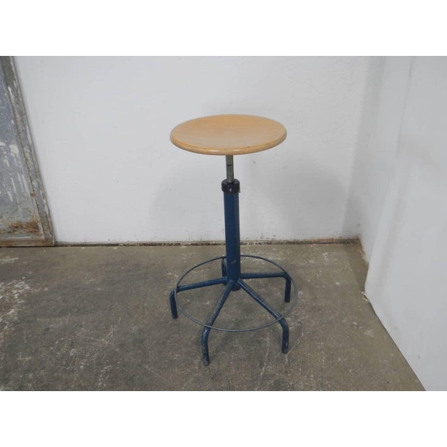 Adjustable height from 63cm to 75cm. Seat diameter 35cm.