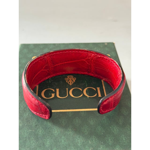 Modern 1990’s Gucci Red Crocodile Style Leather Bracelet With Gold Tone Engraved Logo Narrow Horse Bit For Sale - Image 3 of 11