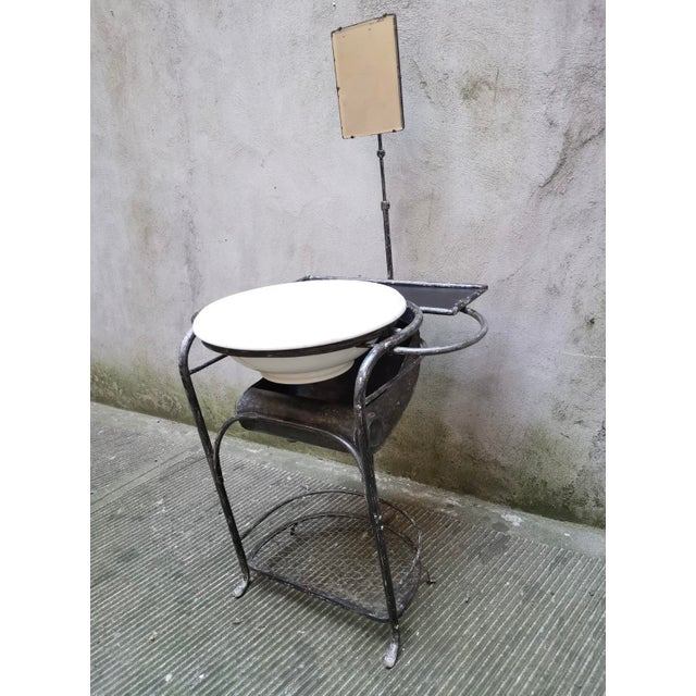 Antique Italian iron dressing table complete with its original mirror and ceramic basin. The mirror measures 18xh.24 cm