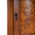 Perfect for dressing up a neglected corner, this cabinet features olive ash burl veneers along its top and door panel. The...