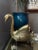 This brass swan has lovely detail and a nice patina beginning to show in the feathered section. It could be used as a vase...