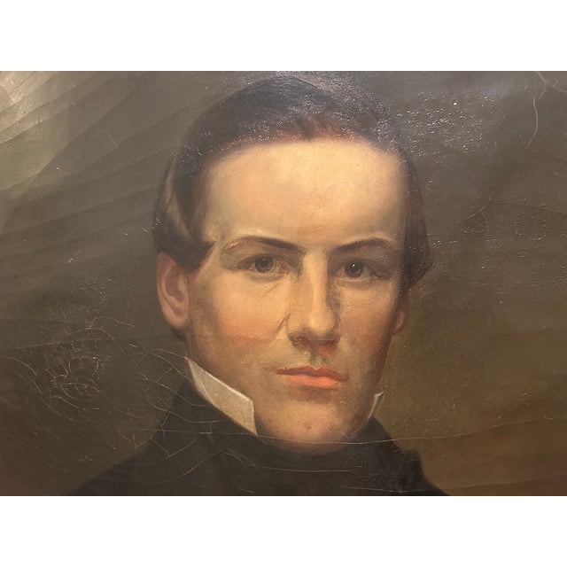 Oil painting on canvas of a well dressed gentleman. This 19th century painting comes in a wood oval frame with a gold...