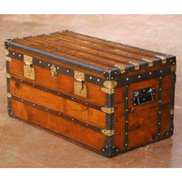 This elegant antique French travel trunk was crafted in Paris, France circa 1890 and reflects the solid, utilitarian...