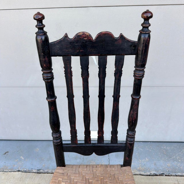 Antique Black-Painted New England Banister-Back Side Chair, Circa 1750s A charming 18th-century New England banister-back...