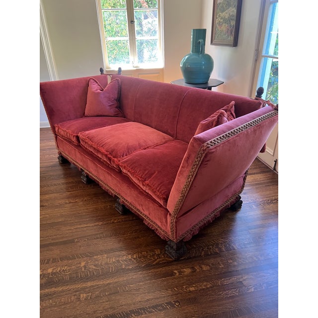 A striking and rare Spanish Revival tuxedo sofa dating to the 1920s, showcasing the romantic elegance and craftsmanship...