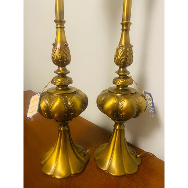 Rembrandt lamps Masterpieces, solid bronze, with original tags, a pair With original manufacturer booklets with design...