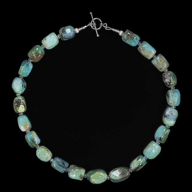 Elevate your jewelry collection with this stunning **19-inch blue-green nugget Peruvian opal necklace**, a piece that...