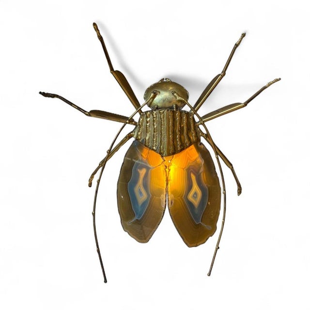 Beetle-shaped wall lights with wings made from agate. Designed by Jacques Duval Brasseur, his pieces are characterized by...