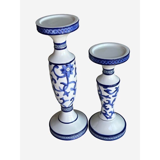 Large Ralph Lauren Pillar candle holders in the Mandarin Blue pattern. One still has the RL label on it and the other has...