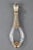 A silver mounted glass scent bottle with shaped baluster body, the part open work collar and foot are pierced and...