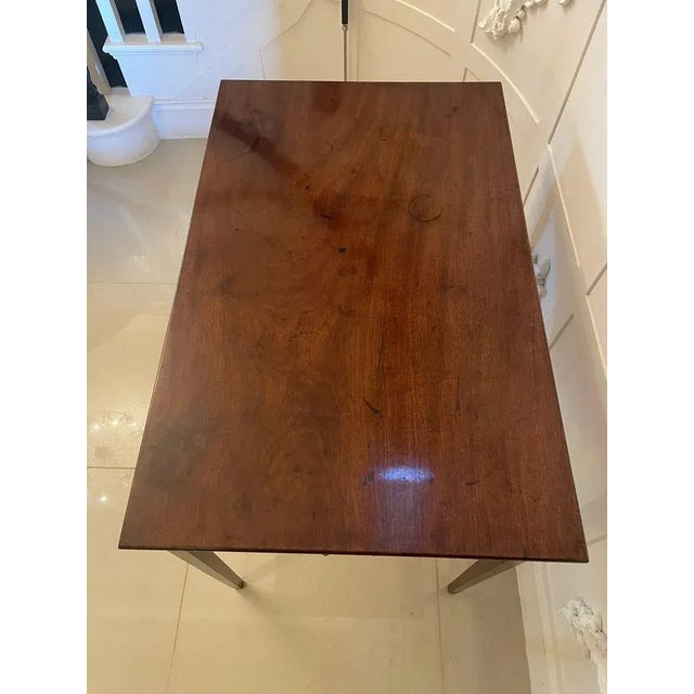 Unusual antique george iii quality mahogany freestanding side table having a quality mahogany top with a thumb moulded...