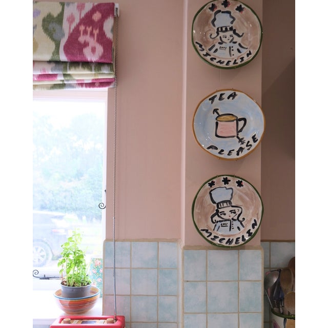 Trio of Kitchen Decorative Hanging Plates by Tatiana Alida A trio of decorative hanging plates, each set includes: Tea...