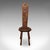 This is an antique Pembrokeshire spinning chair. A Welsh, carved oak work stool, dating to the Victorian period, circa...