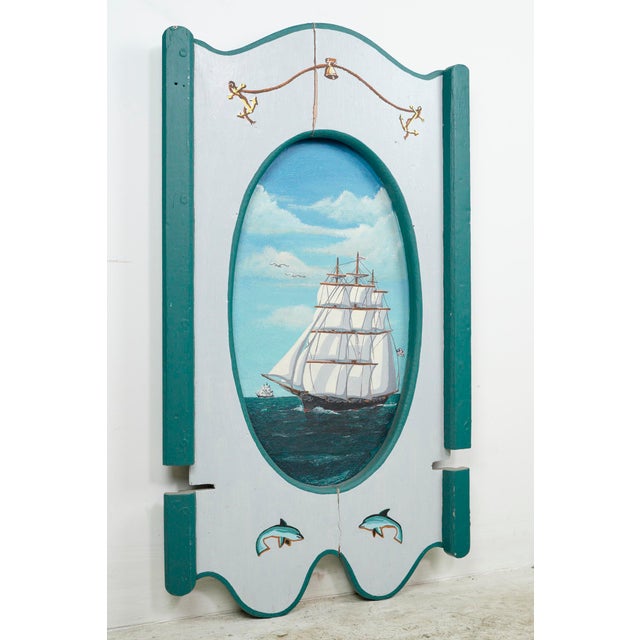 This pair of hand painted wood wall art showcases beautiful sailboat designs in white and blue hues. They are in good...