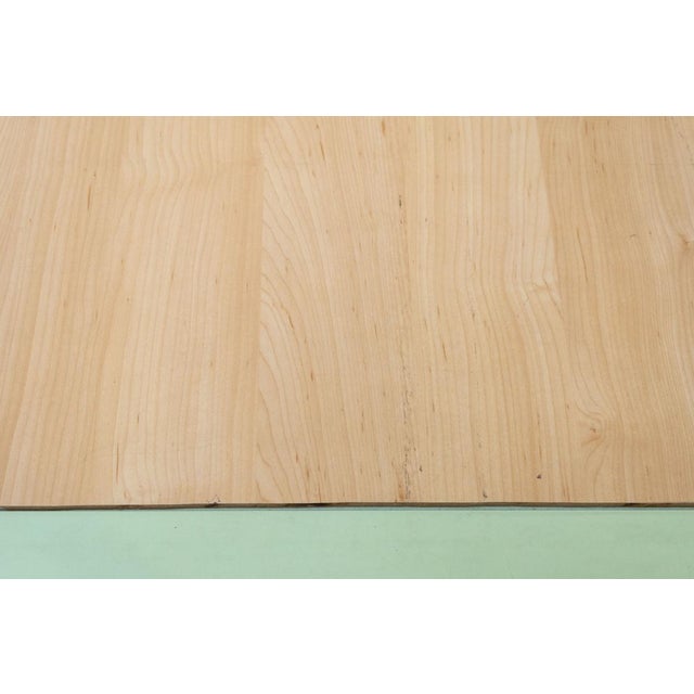 Square coffee table in aqua green. made in the 1980s, the frame is made of mdf (medium-density fiberboard). A central...