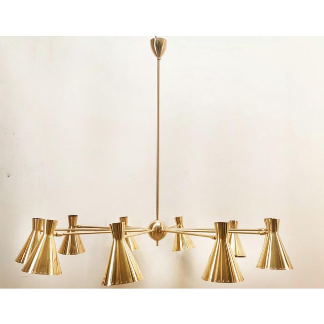 Sputnik 10-Light Chandelier in Brass with Adjustable Domes, in Very Good conditions. Designed 1960 to 1969 Up to 250V...