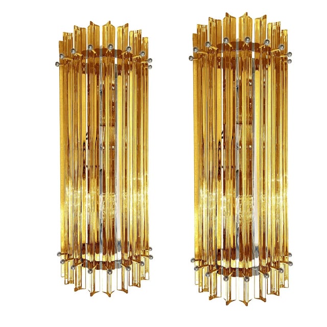 Contemporary amber Triedro Murano Glass Wall Sconces. Set of four. Very elegant , very bright. Metal frame in chromed...