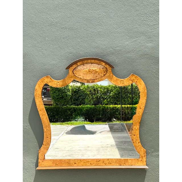This exceptional vintage burl wood wall mirror is a refined example of fine marquetry craftsmanship, combining elegant...
