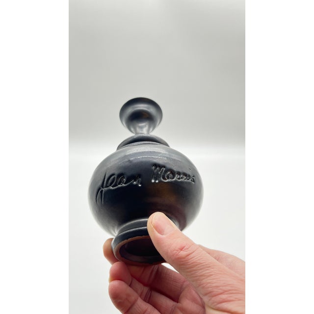 Good evening, Ssoliflore vase in black glazed ceramic, signed by Jean Marais. Very good condition. [ by Art Angelux]...