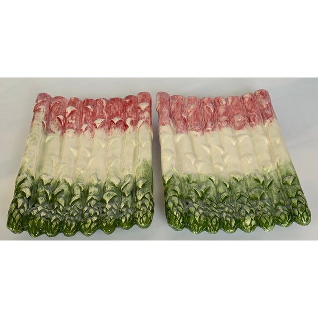 Hand-painted and no two exactly alike, here is a set of vintage asparagus motif studio art plates with raspberry pink...