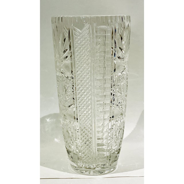 This is a gorgeous, cut crystal vase. Very heavy, no chips or cracks and has fabulous detail! Perfect to grace your next...