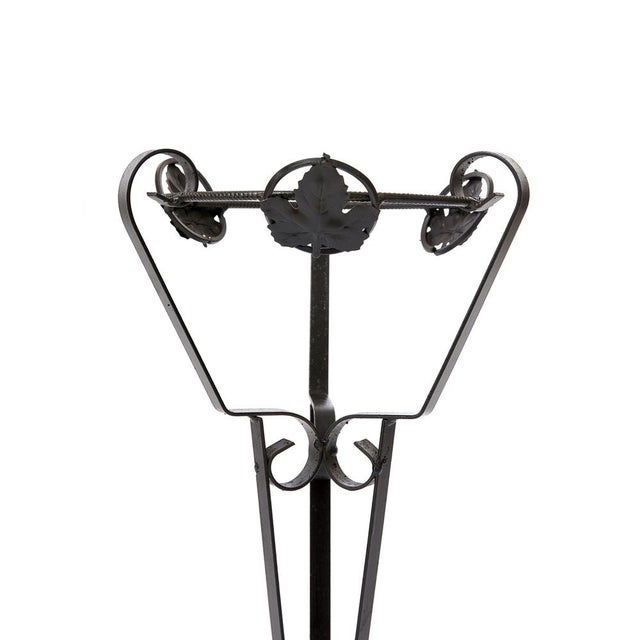 Wrought iron planter with weled joints, decorated with molded iron leaves. Monza, circa 1920s-40s