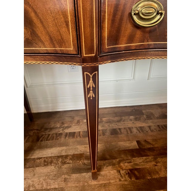 Mahogany sideboard with inlays.