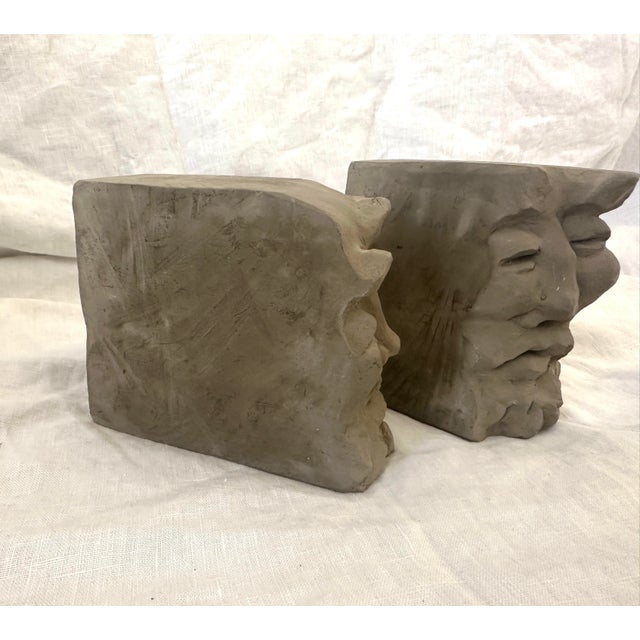 Vintage pair of Eduardo Strauch face bookends made from clay. Unique face that adds character to any bookshelf. 2.25in d x...