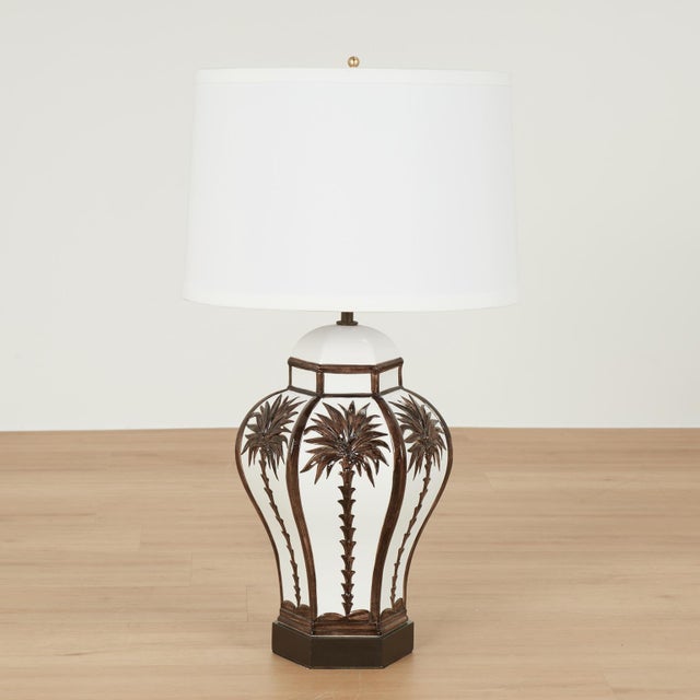 Chic pair of mid century Italian table lamps crafted in porcelain in a classic hexagon ginger jar form decorated with...