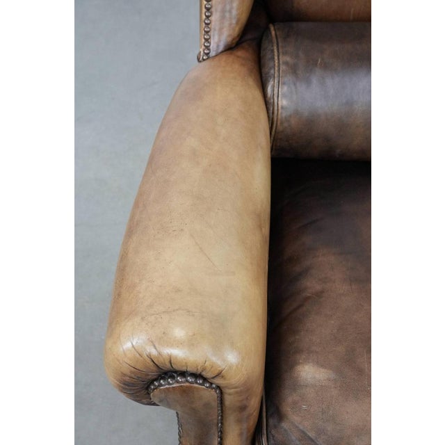 Animal Skin Large Cowhide Leather Wing Chair For Sale - Image 7 of 16