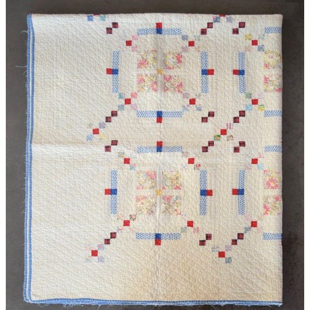 Such a beautiful summer-weight hand-quilted and hand-stitched cotton quilt made with postage stamp sized 1930’s/1940’s...