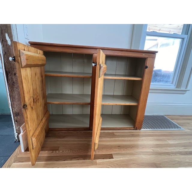 Bring authentic farmhouse charm into your home with this early 1900s pine country cabinet. Rich in character and history,...