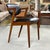 An exceptional set of six Model 42 dining chairs designed by Kai Kristiansen, one of the defining figures of Danish mid-...