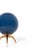 A chic Italian console lamp, newly made. Each lamp has a blue ombre Murano globe that sits atop a brass tripod base.