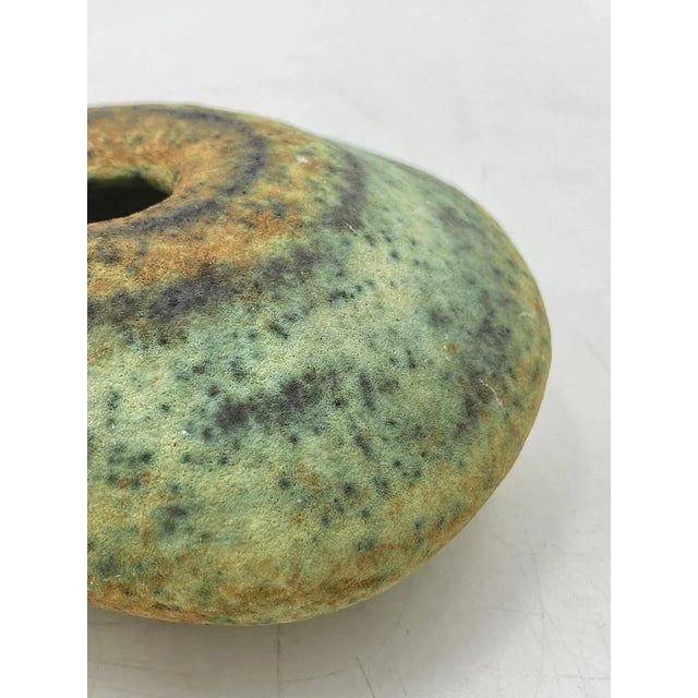 There is a flower vase for sale *rare collector's item *from the hungarian ceramic artist simó ágoston (1925-2011) *studio...